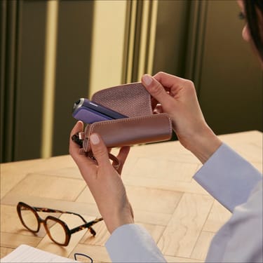 Ploom Aura Rose Gold Solo Carry Case accessory on a table