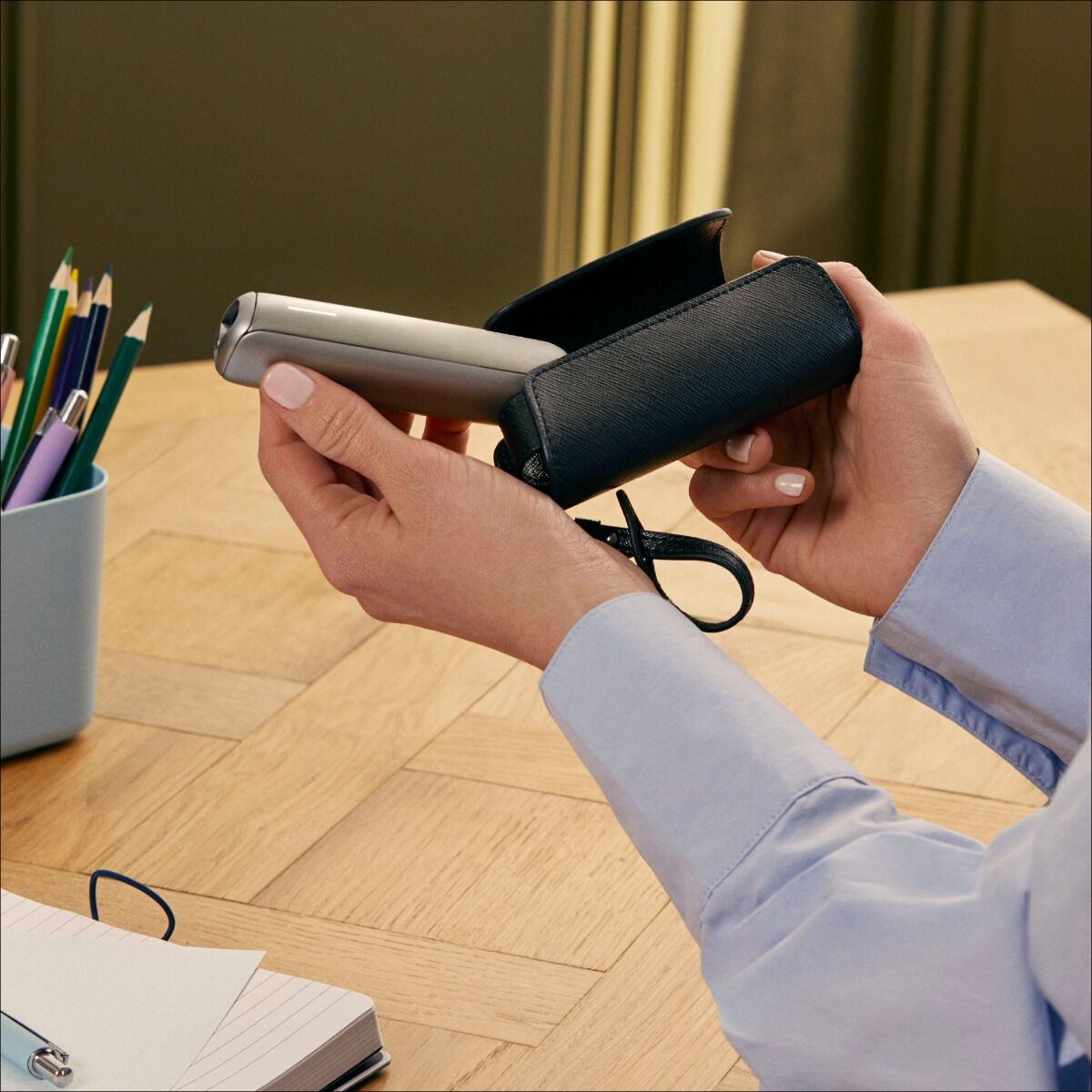 Ploom Aura Jet Black Solo Carry Case accessory on a table